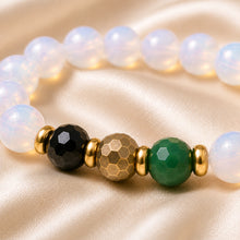 Load image into Gallery viewer, Close-up of Libra / Tula Rashi Bracelet with 8 mm beads and diamond-cut front accents