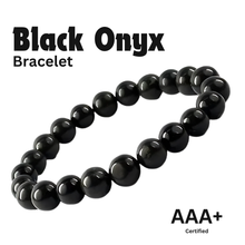 Load image into Gallery viewer, Close-up of Black Onyx bracelet showing intricate details and natural Black Onyx stone.