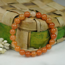 Load image into Gallery viewer, A collection of Red Aventurine bracelet showcasing different styles and sizes along with their Red Aventurine bracelet benefits.