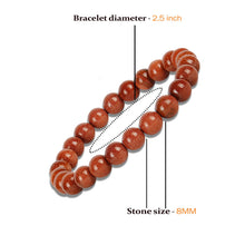 Load image into Gallery viewer, Model wearing a stylish Red Sunstone bracelet to highlight its elegance and aesthetic appeal. Get to know more about the Red Sunstone benefits