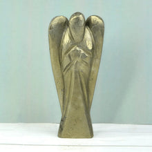 Load image into Gallery viewer, Angel figurine placed on a white table in a minimal decorative setting.