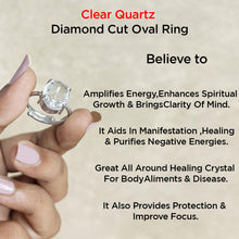 Load image into Gallery viewer, Diamond-cut oval clear quartz ring set in a polished metal band, symbolizing clarity and positive energy.