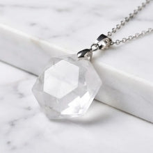 Load image into Gallery viewer, Clear Quartz Hexagon Pendant – Symbol of Energy, Amplification, and Clarity – Perfect for Daily Wear - Side View | Natural Sphatik, Seven Chakra Crystal Ring for Chakra Balance & Energy Alignment