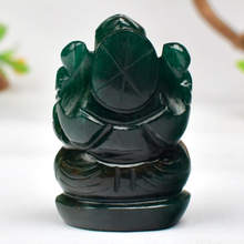 Load image into Gallery viewer, Dark green Ganesh figurine carved from stone, shown from the back on a plain white background, highlighting polished details