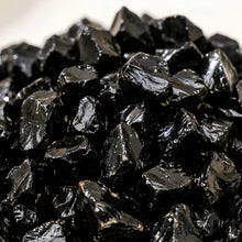 Load image into Gallery viewer, Close-up of authentic natural Black Obsidian showing crystal texture, colour and craftsmanship – black obsidian chips stone symbol of protection grounding and