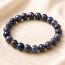 Load image into Gallery viewer, Blue Sunstone Bracelet displayed fully on white silk cloth to show its natural colour, shape and finish