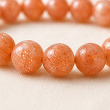 Load image into Gallery viewer, Close-up of authentic natural Carnelian showing crystal texture, colour and craftsmanship – carnelian bracelet for vitality motivation confidence and inner