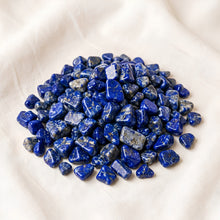 Load image into Gallery viewer, Lapis Lazuli Chips displayed fully on white silk cloth to show its natural colour, shape and finish