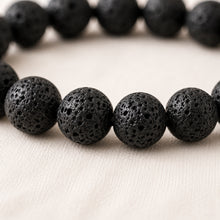 Load image into Gallery viewer, Close-up of authentic natural Lava Extract Bracelet showing crystal texture, colour and craftsmanship