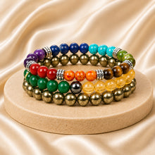 Load image into Gallery viewer, Money Attraction Bracelet Combo displayed fully on white silk cloth to show its natural colour, shape and finish