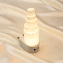 Load image into Gallery viewer, Selenite Lamp displayed fully on white silk cloth to show its natural colour, shape and finish