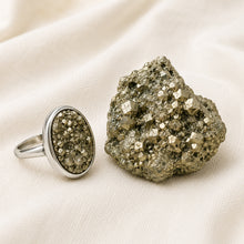 Load image into Gallery viewer, Pyrite Ring displayed fully on white silk cloth to show its natural colour, shape and finish