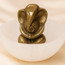 Load image into Gallery viewer, Close-up of authentic natural Selenite and Pyrite showing crystal texture, colour and craftsmanship – selenite bowl and pyrite ganesh set symbols of purity
