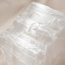 Load image into Gallery viewer, Close-up of authentic natural Selenite showing crystal texture, colour and craftsmanship – selenite raw stone symbol of purity clarity and high vibration