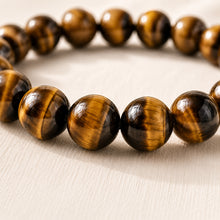 Load image into Gallery viewer, Close-up of authentic natural Tiger Eye showing crystal texture, colour and craftsmanship