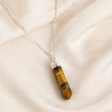 Load image into Gallery viewer, Close-up of authentic natural Tiger Eye showing crystal texture, colour and craftsmanship – tiger eye pencil pendant with chain helps in protection confidence