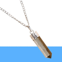 Load image into Gallery viewer, Natural pyrite crystal pendant necklace with silver chain shown against a minimal white backdrop.