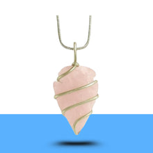 Load image into Gallery viewer, Polished rose quartz arrowhead gemstone pendant symbolizing love and strength