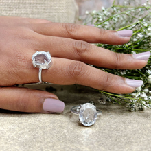 Load image into Gallery viewer, Pair of two clear crystal adjustable rings displayed together, featuring a polished band and elegant minimalist design.