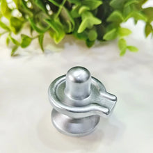Load image into Gallery viewer, Top-shot realistic photo of a Parad Mercury Shivling with smooth polished silver surface.