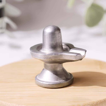 Load image into Gallery viewer, Realistic photo of a Parad Mercury Shivling with polished silver shine on a clean backdrop.