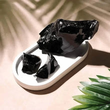 Load image into Gallery viewer, Raw Black Obsidian crystal stones representing protection, grounding, and truth.