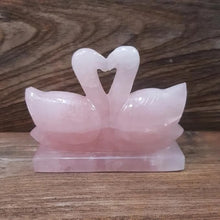 Load image into Gallery viewer, Rose Quartz Swan Pair Figurine – Crystal for Love, Marriage & Relationship Harmony - Lifestyle View | Natural Rose Quartz Crystal Ring for Love & Relationship Harmony