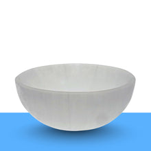 Load image into Gallery viewer, Crystal cleansing ritual with a selenite bowl for clearing negative energy