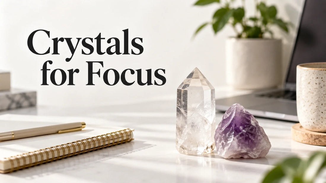 Clear quartz and amethyst on a study desk for a focus and concentration crystal guide