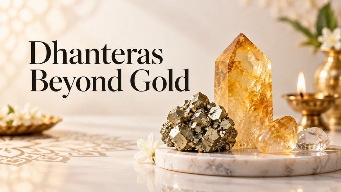 Pyrite and citrine crystals with festive diyas shown as crystal alternatives for Dhanteras gifting