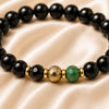Close-up of Capricorn / Makar Rashi Bracelet with 8 mm beads and diamond-cut front accents