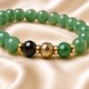 Close-up of Gemini / Mithun Rashi Bracelet with 8 mm beads and diamond-cut front accents