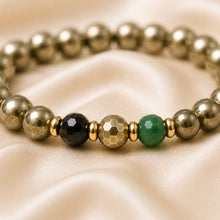 Load image into Gallery viewer, Close-up of Leo / Singh Rashi Bracelet with 8 mm beads and diamond-cut front accents
