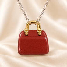 Load image into Gallery viewer, Natural Red Jasper mini handbag pendant by Evashu Crystals - view 4 - 04 red jasper handbag pendant lifestyle product only
