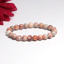 Load image into Gallery viewer, The Red Picasso Jasper bracelet with a focus on its vibrant color and unique texture.
