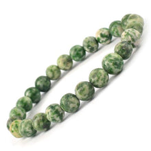 Load image into Gallery viewer, Model wearing a stylish Tree Agate bracelet to highlight its elegance and aesthetic appeal. Get to know more about the Tree Agate benefits
