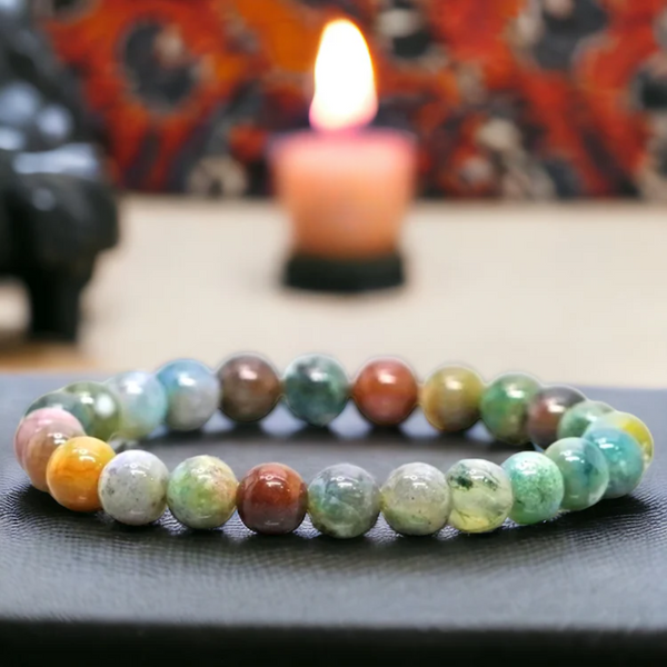 Lifestyle shot of a Indian Agate bracelet on a person's wrist, emphasizing comfort and beauty.