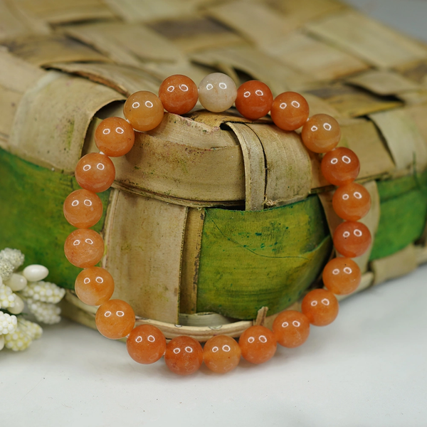 A collection of Red Aventurine bracelet showcasing different styles and sizes along with their Red Aventurine bracelet benefits.