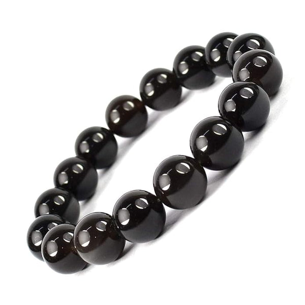 Model wearing a stylish Black Obsidian bracelet to highlight its elegance and aesthetic appeal. Get to know more about the Black Obsidian benefits