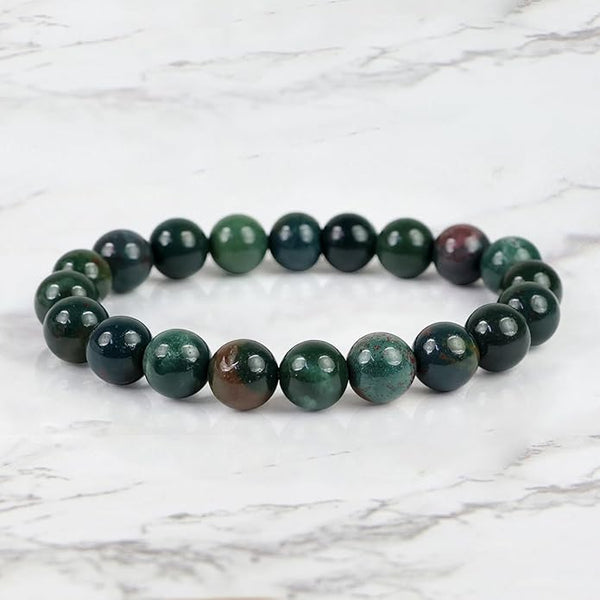 The Bloodstone bracelet with a focus on its vibrant color and unique texture.
