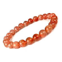 Load image into Gallery viewer, Model wearing a stylish Sunstone bracelet to highlight its elegance and aesthetic appeal. Get to know more about the Sunstone benefits
