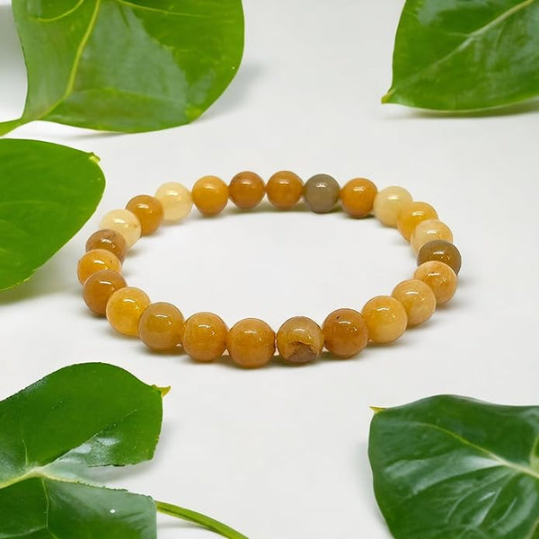 The Yellow Aventurine bracelet with a focus on its vibrant color and unique texture.