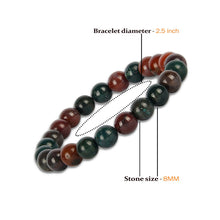 Load image into Gallery viewer, Model wearing a stylish Bloodstone bracelet to highlight its elegance and aesthetic appeal. Get to know more about the Bloodstone benefits
