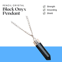 Minimalist shot of a Black Tourmaline pencil pendant on a white background featuring a light blue lower section