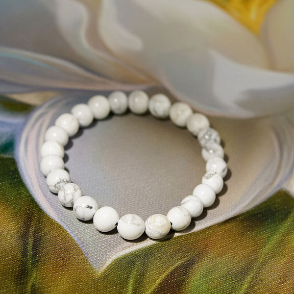A collection of Howlite bracelet showcasing different styles and sizes along with their Howlite bracelet benefits.