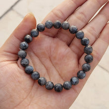 Load image into Gallery viewer, The Larvikite bracelet with a focus on its vibrant color and unique texture.
