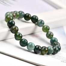 Load image into Gallery viewer, The Moss Agate bracelet with a focus on its vibrant color and unique texture.

