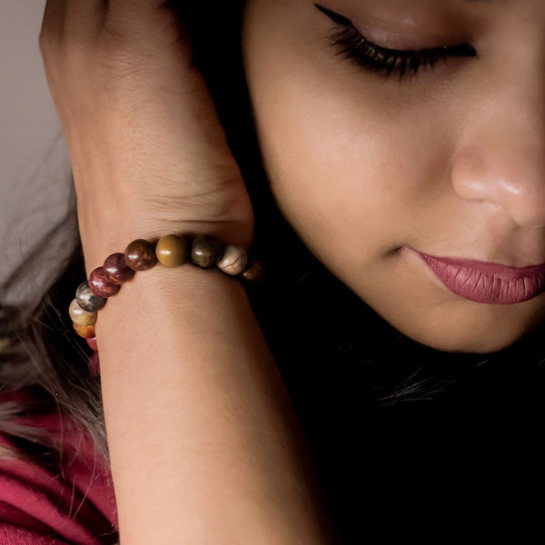 Lifestyle shot of a Multi Picasso bracelet on a person's wrist, emphasizing comfort and beauty.