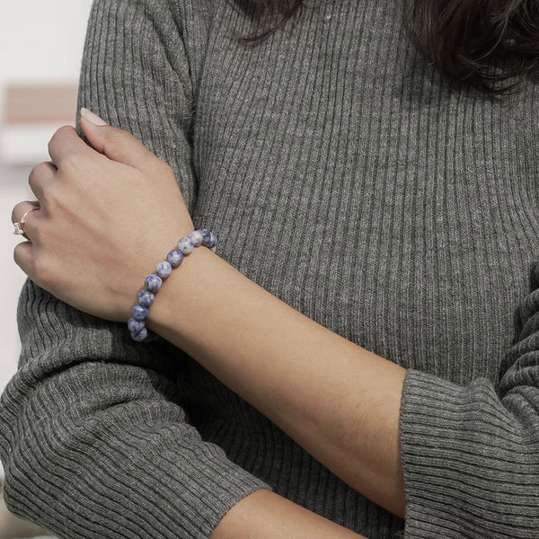 Lifestyle shot of a Sodalite bracelet on a person's wrist, emphasizing comfort and beauty.