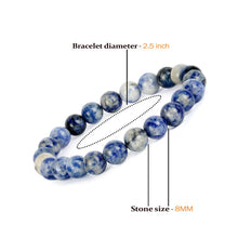 Load image into Gallery viewer, The Sodalite bracelet with a focus on its vibrant color and unique texture.
